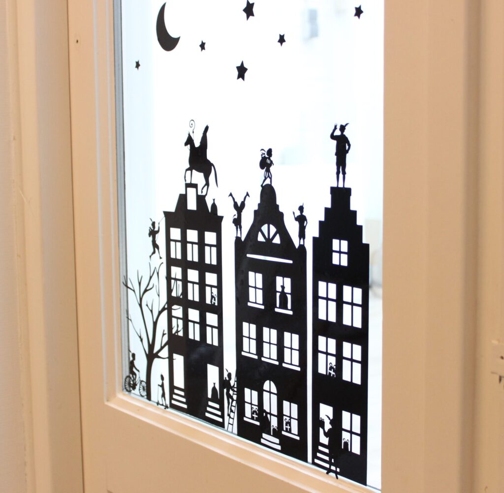 Herbruikbare raamstickers, raamstraatje voor sinterklaas met grachtenpanden. Herbruikbaar en zonder plaksel.