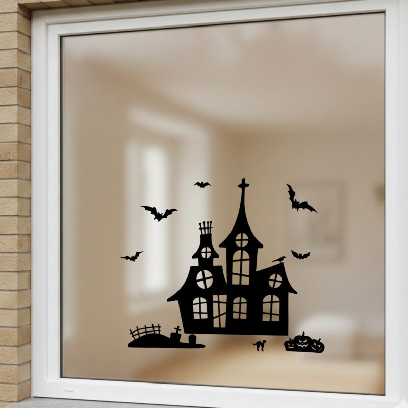Herbruikbare Halloween raamstickers Haunted House met vleermuizen en grafstenen van statische raamfolie